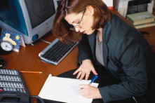 writing at desk